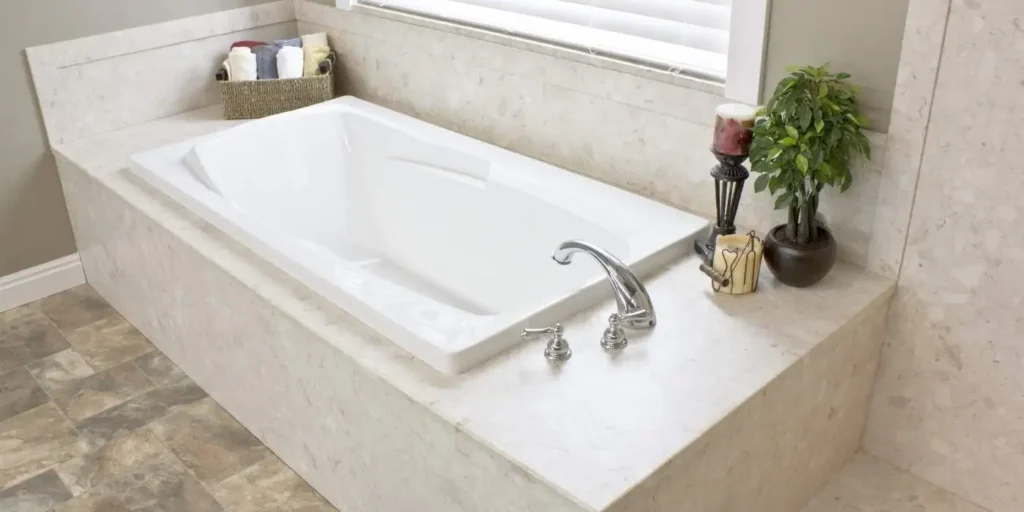 Modern bathroom with a stylish freestanding tub showcasing the best bathtub material options